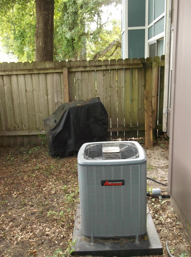 302 Olympia Ct, Fort Walton Beach, FL 32547 - exterior view of fence and central AC unit