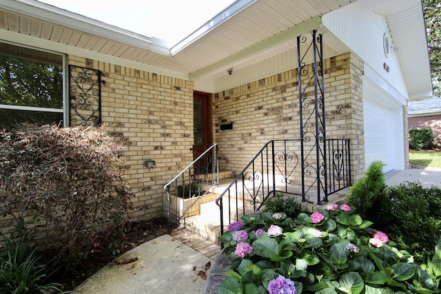 35 Birch Ave, Shalimar, FL 32579 - property entrance with brick siding and an attached garage