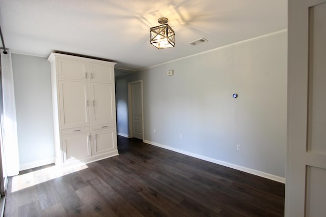 35 Birch Ave, Shalimar, FL 32579 - spare room with dark wood-type flooring and baseboards