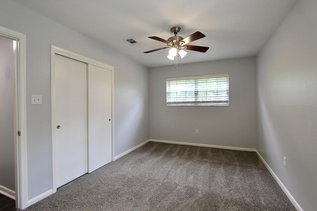 35 Birch Ave, Shalimar, FL 32579 - unfurnished bedroom featuring carpet, a closet, and ceiling fan