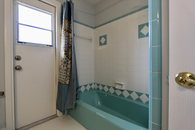 35 Birch Ave, Shalimar, FL 32579 - bathroom with shower / bath combo and tile patterned floors