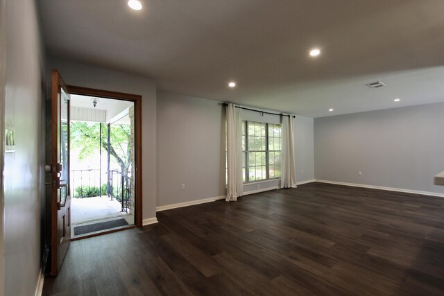 35 Birch Ave, Shalimar, FL 32579 - empty room featuring dark wood-type flooring and recessed lighting