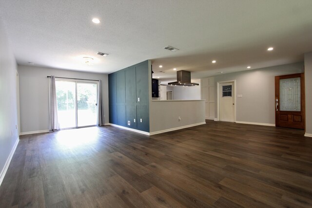 35 Birch Ave, Shalimar, FL 32579 - unfurnished living room featuring dark wood-type flooring and recessed lighting