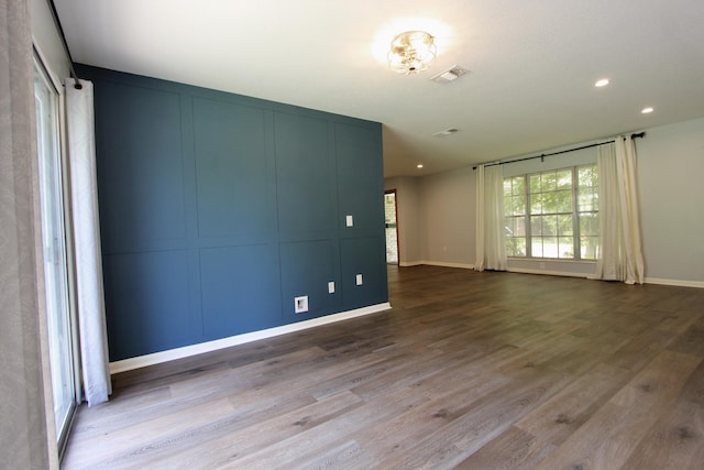 35 Birch Ave, Shalimar, FL 32579 - spare room featuring wood finished floors and recessed lighting