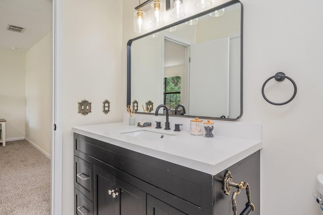 128 5th Ave, Shalimar, FL 32579 - bathroom with vanity and baseboards
