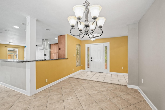 3 NE Windsor Ln, Fort Walton Beach, FL 32547 - entrance foyer featuring a chandelier, light tile patterned floors, baseboards, and recessed lighting