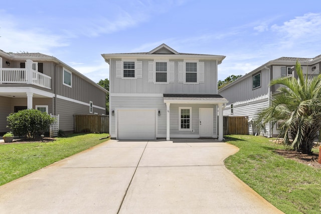 24 Bald Cypress Way, Santa Rosa Beach, FL 32459 - traditional-style house featuring a garage, concrete driveway, and board and batten siding