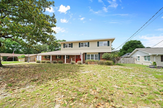 197 Country Club Rd, Shalimar, FL 32579 - view of front of home with brick siding and fence