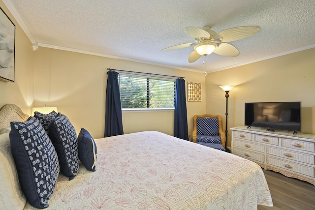 3755 Scenic Highway 98 Unit 1601, Destin, FL 32541 - bedroom featuring wood finished floors, ornamental molding, a textured ceiling, and ceiling fan