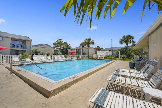 3755 Scenic Highway 98 Unit 1601, Destin, FL 32541 - community pool with a patio, fence, and a residential view