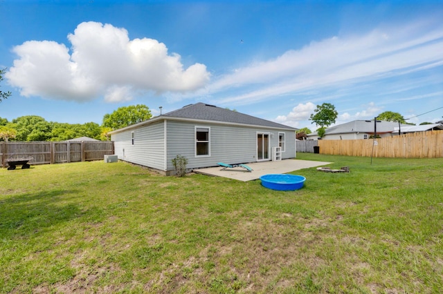 rear view of property with a patio area
