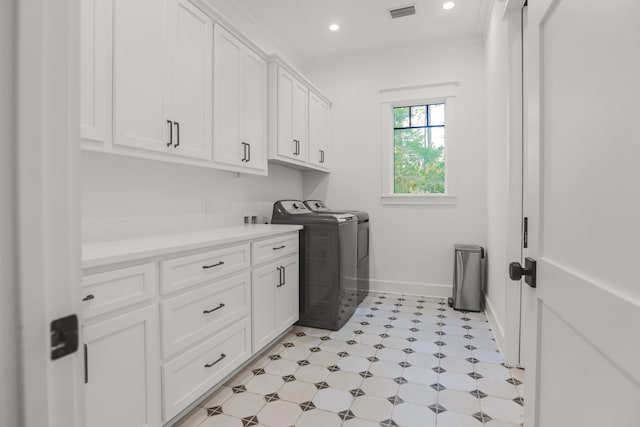 1807 Lost Cove Ct, Panama City Beach, FL 32413 - laundry room with cabinet space, washing machine and clothes dryer, baseboards, light flooring, and recessed lighting