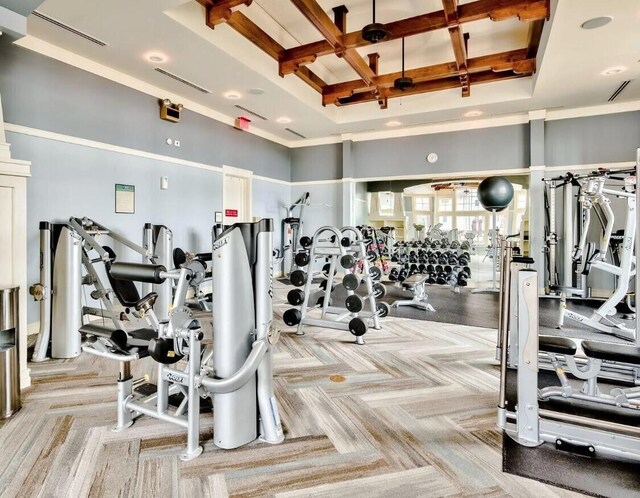 1807 Lost Cove Ct, Panama City Beach, FL 32413 - gym with light carpet, coffered ceiling, a high ceiling, and beamed ceiling
