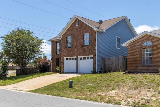 view of front of house with brick siding, concrete driveway, and a garage