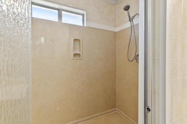 full bathroom featuring a tile shower
