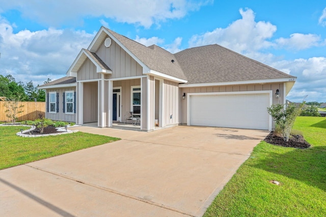602 Champ Trl, Crestview, FL 32539 - view of front of property featuring a garage, a shingled roof, and driveway