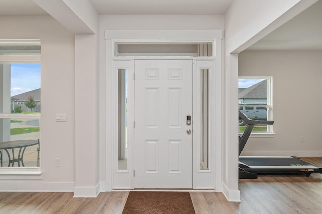 602 Champ Trl, Crestview, FL 32539 - entryway with wood finished floors, healthy amount of natural light, and baseboards
