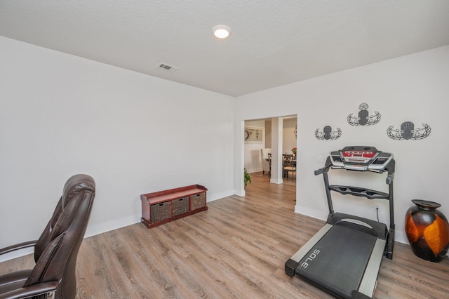 602 Champ Trl, Crestview, FL 32539 - exercise room featuring light wood-type flooring and baseboards