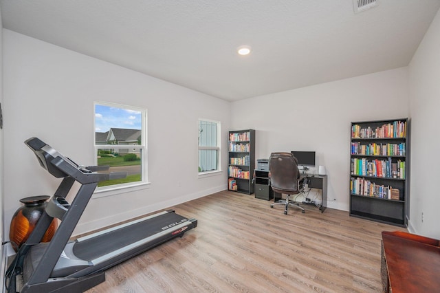 602 Champ Trl, Crestview, FL 32539 - home office with light wood finished floors, baseboards, and recessed lighting