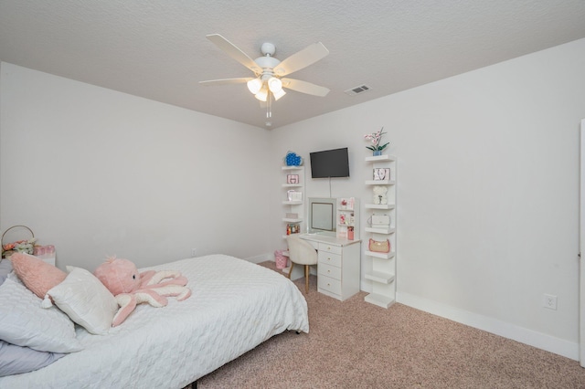 602 Champ Trl, Crestview, FL 32539 - bedroom featuring carpet, baseboards, a ceiling fan, and a textured ceiling