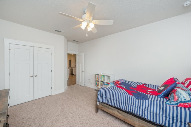 602 Champ Trl, Crestview, FL 32539 - bedroom with carpet flooring, baseboards, ceiling fan, and a closet