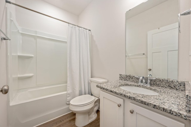 602 Champ Trl, Crestview, FL 32539 - full bathroom featuring wood finished floors, toilet, vanity, and shower / tub combo with curtain