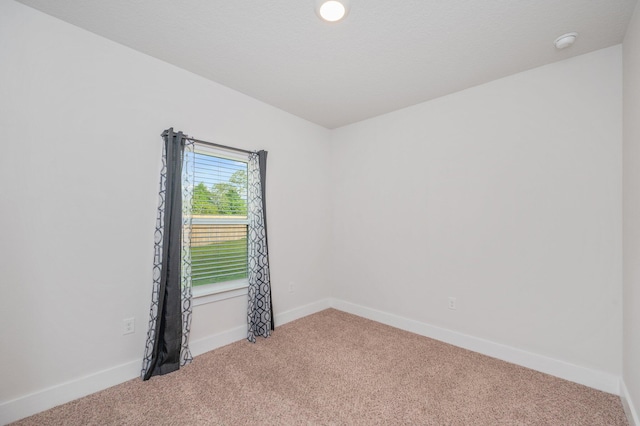 602 Champ Trl, Crestview, FL 32539 - unfurnished room with light colored carpet, a smoke detector, and baseboards