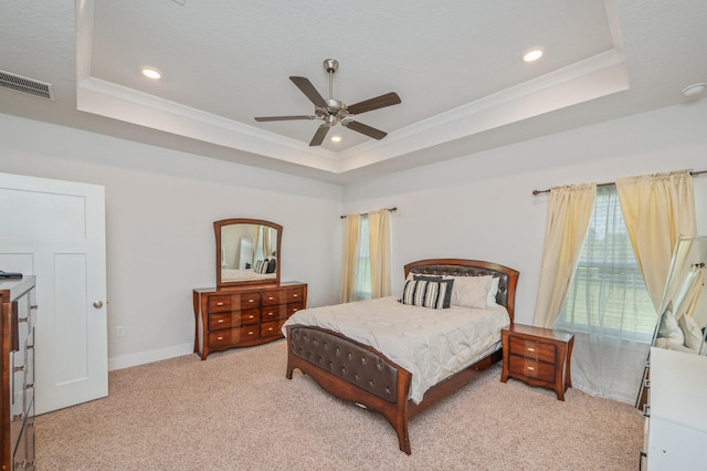 602 Champ Trl, Crestview, FL 32539 - bedroom with a raised ceiling, light colored carpet, recessed lighting, crown molding, and ceiling fan