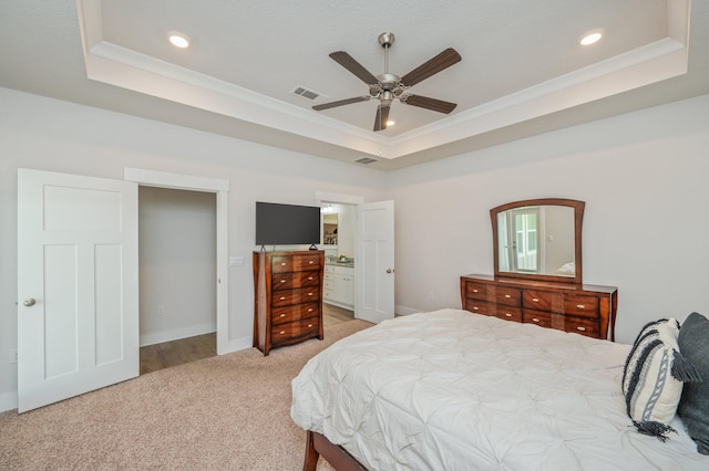 602 Champ Trl, Crestview, FL 32539 - bedroom featuring a raised ceiling, light colored carpet, crown molding, recessed lighting, and baseboards