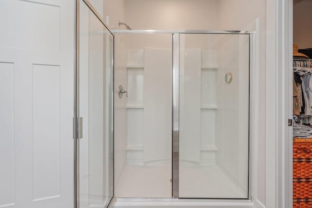 602 Champ Trl, Crestview, FL 32539 - full bath featuring a shower stall and a walk in closet