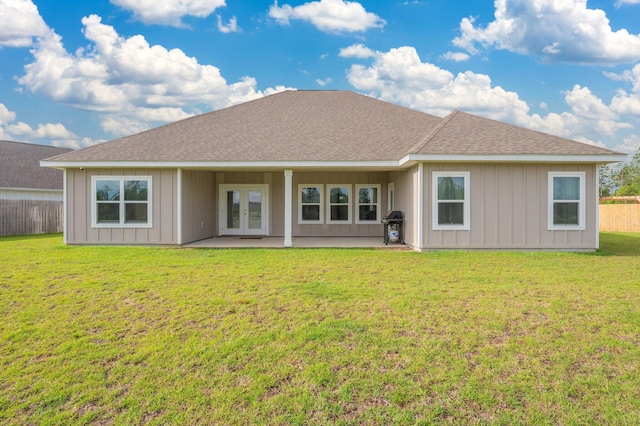 602 Champ Trl, Crestview, FL 32539 - rear view of house featuring french doors, a patio, a shingled roof, and board and batten siding