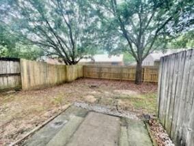 1413 Beaver Run Rd Unit 7, Niceville, FL 32578 - fenced backyard featuring a patio area