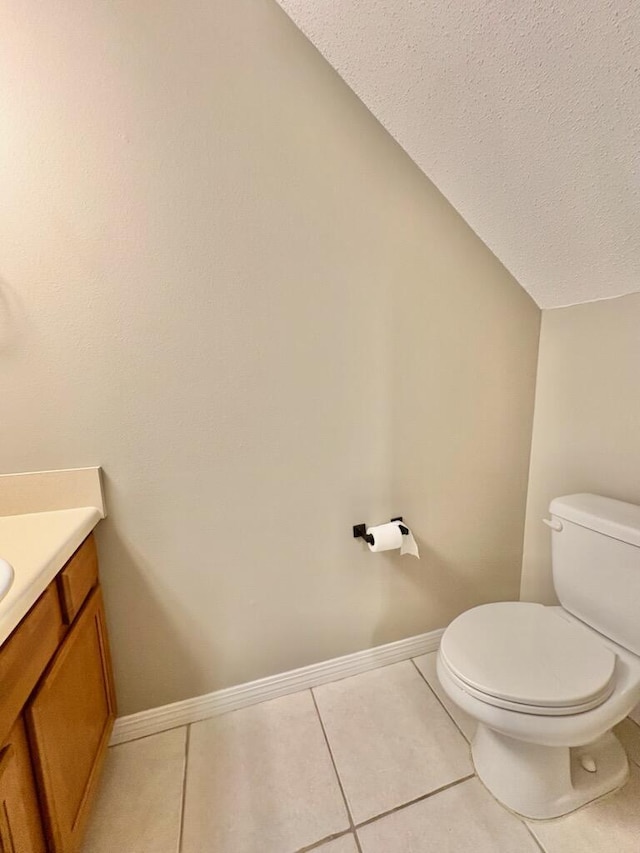 1413 Beaver Run Rd Unit 7, Niceville, FL 32578 - bathroom featuring vanity, tile patterned flooring, and a textured ceiling