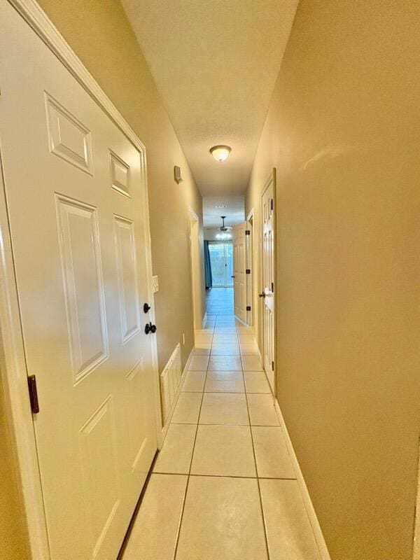 1413 Beaver Run Rd Unit 7, Niceville, FL 32578 - hall featuring light tile patterned floors and baseboards