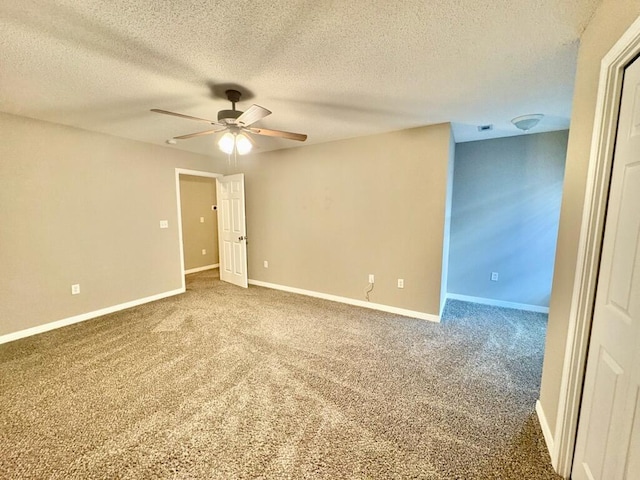 1413 Beaver Run Rd Unit 7, Niceville, FL 32578 - spare room featuring a ceiling fan, carpet flooring, and a textured ceiling