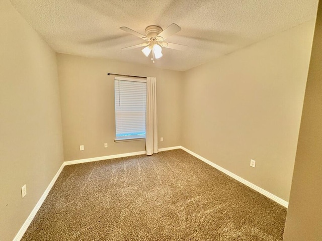 1413 Beaver Run Rd Unit 7, Niceville, FL 32578 - empty room with a ceiling fan, dark carpet, and a textured ceiling