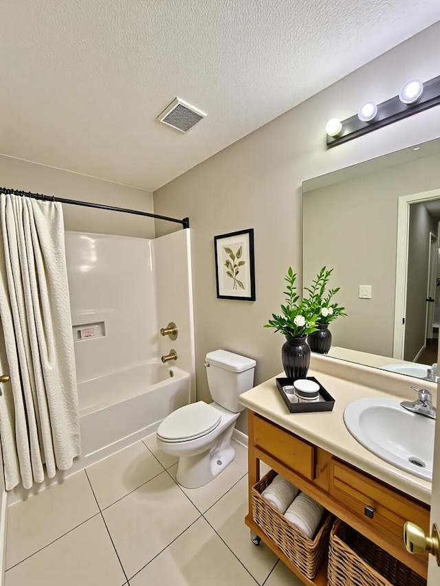 1413 Beaver Run Rd Unit 7, Niceville, FL 32578 - bathroom with tile patterned flooring, shower / bath combination with curtain, vanity, and a textured ceiling