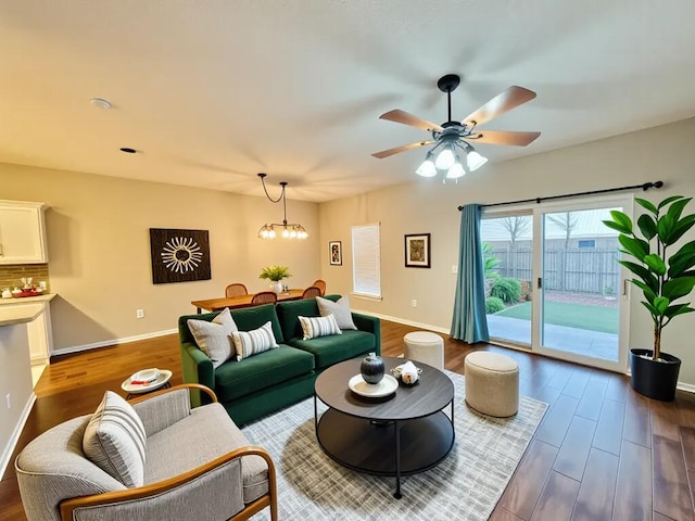 1413 Beaver Run Rd Unit 7, Niceville, FL 32578 - living room featuring dark wood-type flooring, ceiling fan, and a chandelier