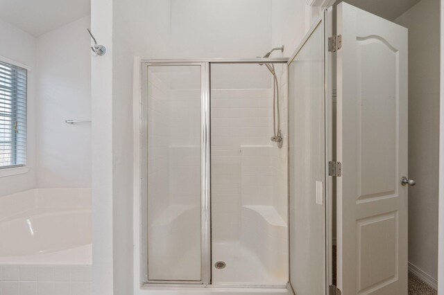 613 Prairie St, Crestview, FL 32536 - bathroom with a shower stall and a bath