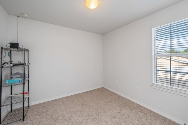 613 Prairie St, Crestview, FL 32536 - carpeted spare room featuring baseboards and a smoke detector