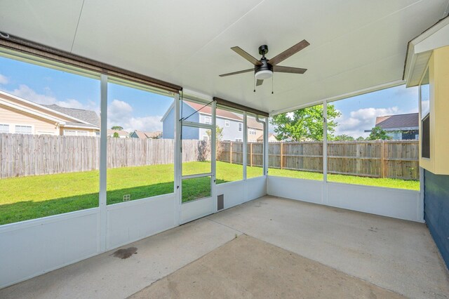 613 Prairie St, Crestview, FL 32536 - unfurnished sunroom featuring a ceiling fan