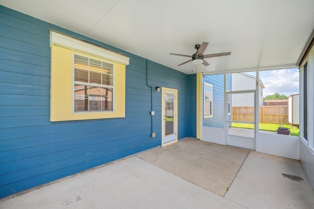 613 Prairie St, Crestview, FL 32536 - unfurnished sunroom with a ceiling fan