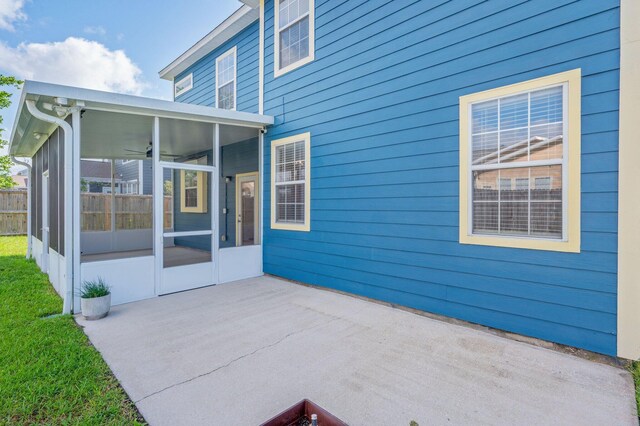 613 Prairie St, Crestview, FL 32536 - view of patio featuring a sunroom