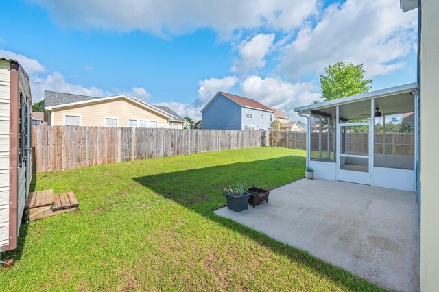 613 Prairie St, Crestview, FL 32536 - view of yard with a patio area and a sunroom