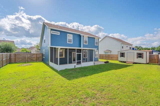 613 Prairie St, Crestview, FL 32536 - back of house with a sunroom, a storage unit, an outdoor structure, and a patio