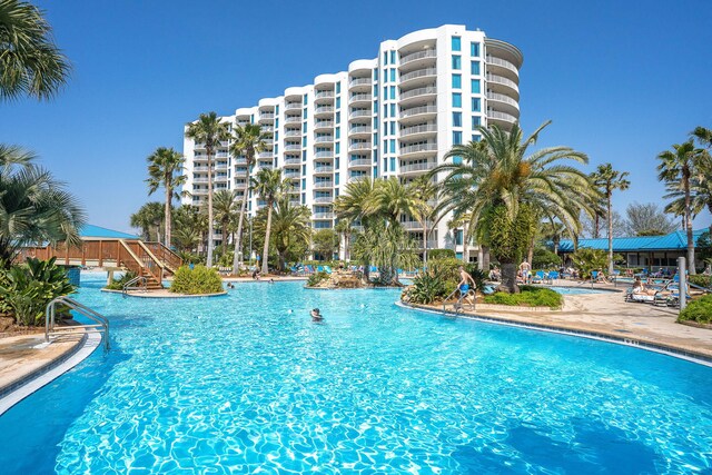 4207 Indian Bayou Trl Unit 2513, Destin, FL 32541 - community pool featuring a patio