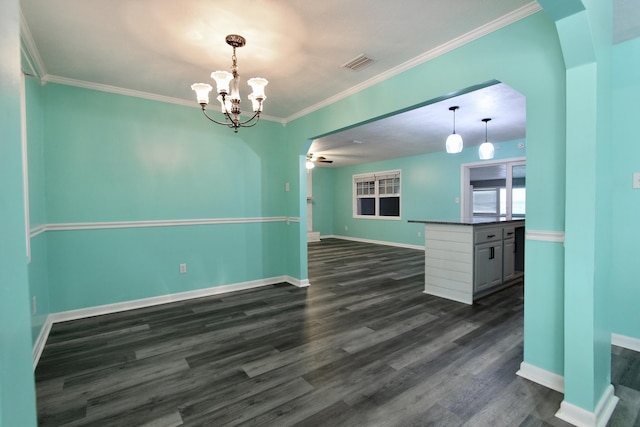 3961 Painter Branch Rd, Crestview, FL 32539 - unfurnished room with dark wood-style flooring, a chandelier, crown molding, and baseboards