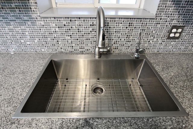 3961 Painter Branch Rd, Crestview, FL 32539 - kitchen view of a sink and tasteful backsplash