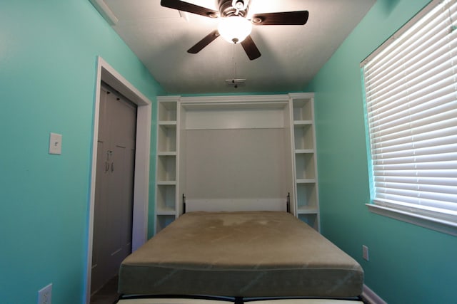 3961 Painter Branch Rd, Crestview, FL 32539 - bedroom featuring ceiling fan and baseboards