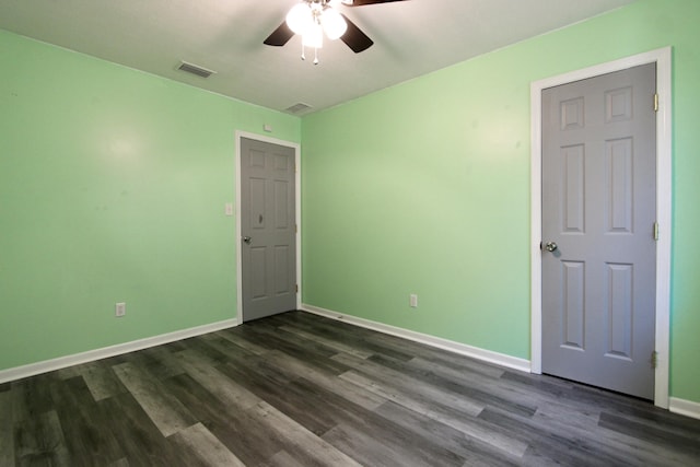 3961 Painter Branch Rd, Crestview, FL 32539 - spare room with a ceiling fan, baseboards, and dark wood finished floors